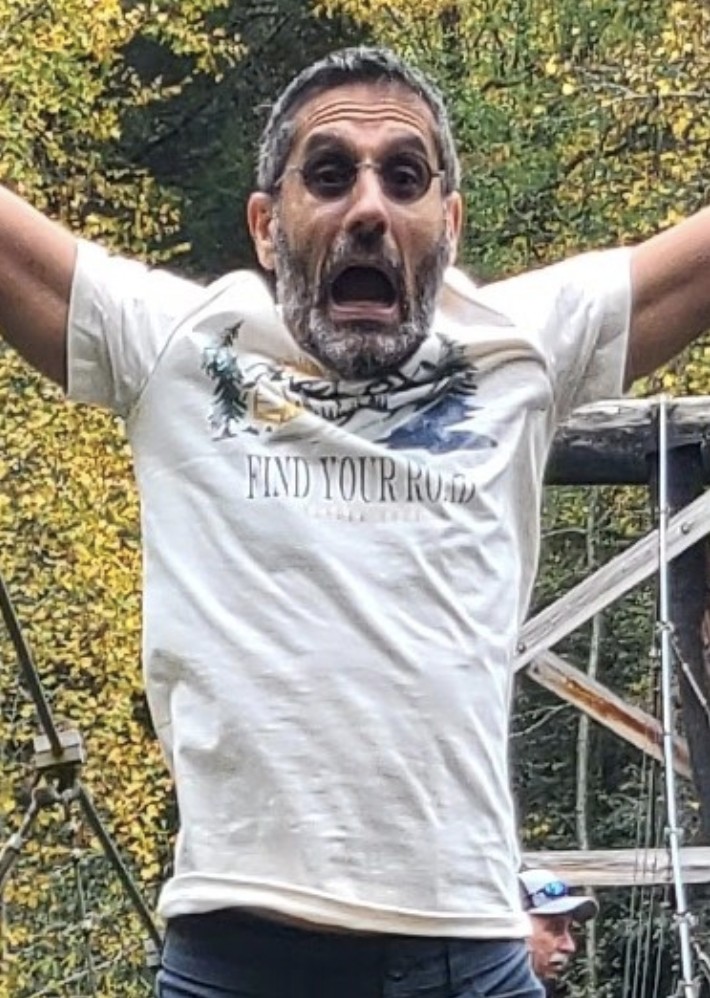 Sajjad, arms out and full of energy
